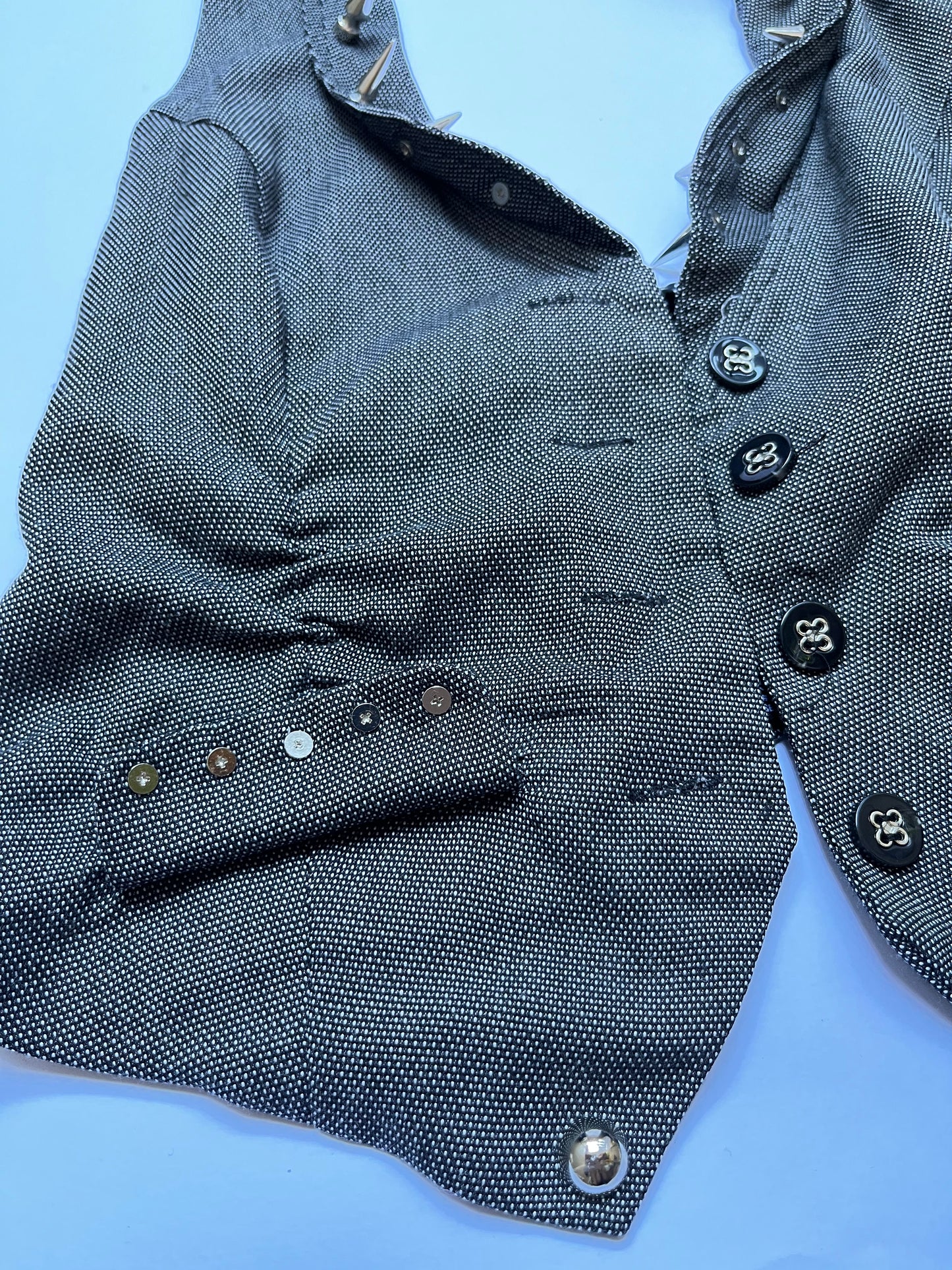 STUDDED VEST
